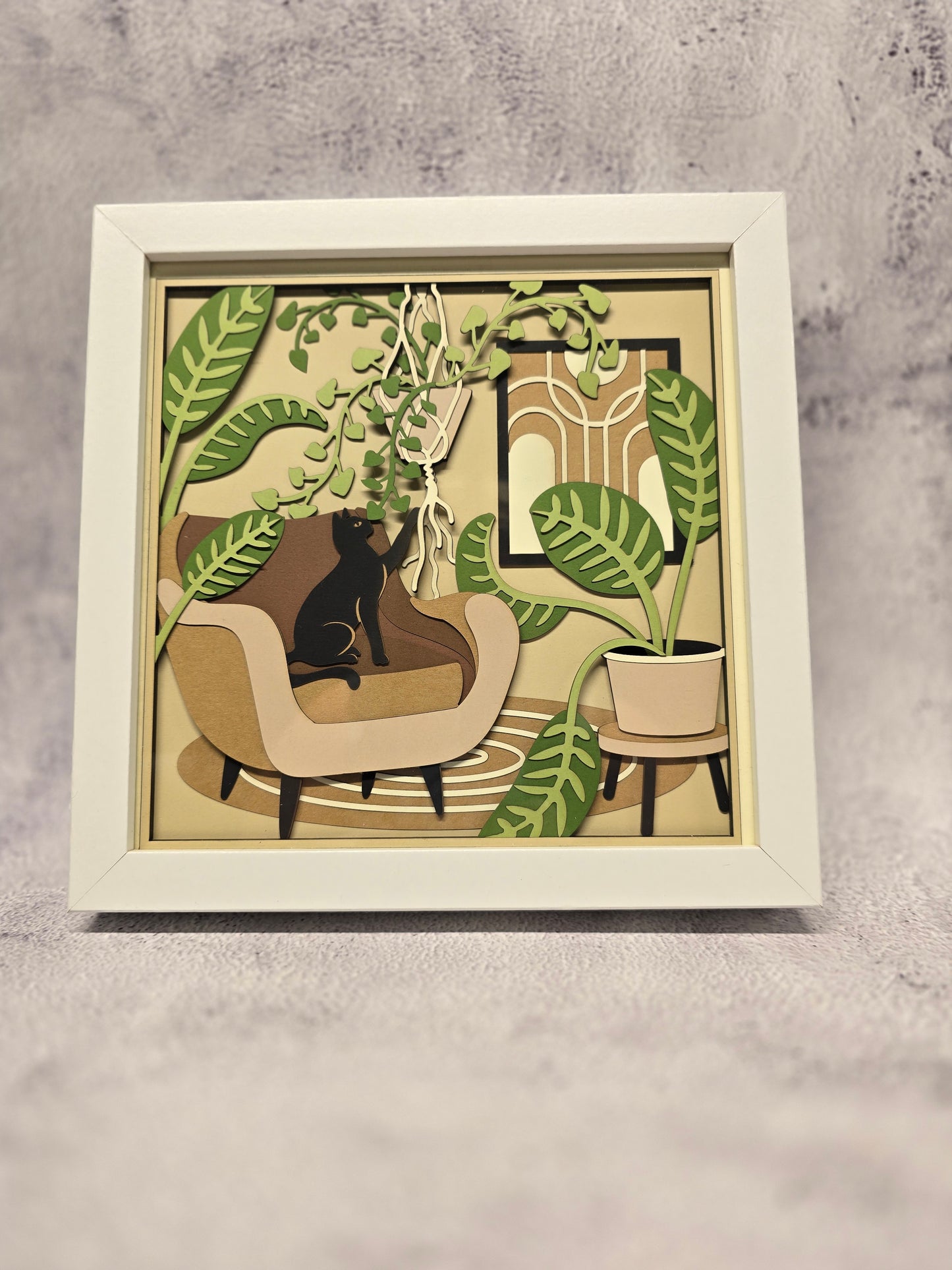 Cat playing with Plants